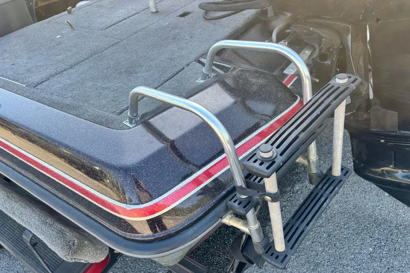 Slide: The Image of Rear view of 1995 ProCraft V-180 boat with ladder and carpeted deck. - 8