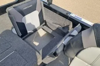 Slide: The Image of 2019 Crestliner 1850 Fish Hawk WT boat interior with gray seating and storage compartments. - 14