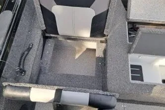 Slide: The Image of 2019 Crestliner 1850 Fish Hawk WT interior seating and storage compartments. - 15