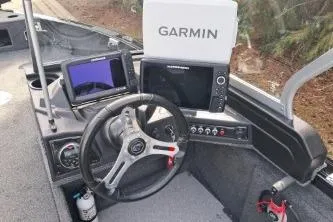 Slide: The Image of 2019 Crestliner 1850 Fish Hawk WT boat dashboard with Garmin navigation system. - 9