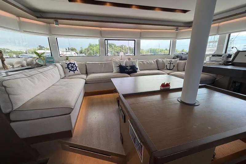 Slide: The Image of Luxurious interior of 2021 Lagoon 50 yacht with spacious seating and nautical decor. - 13