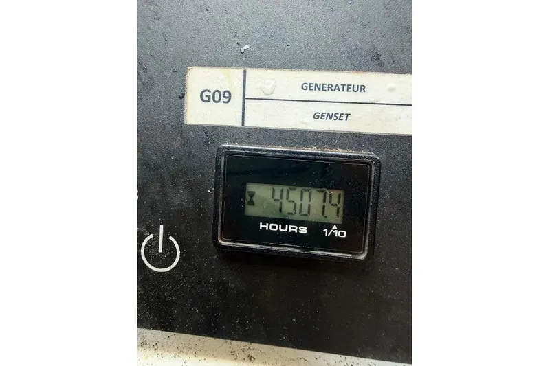 Slide: The Image of Control panel of a 2021 Lagoon 50 generator, displaying 4507.4 hours. - 28