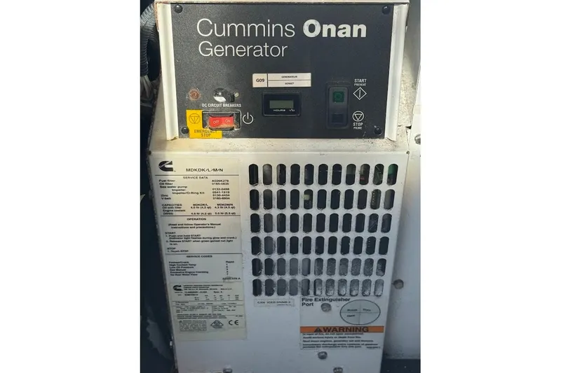 Slide: The Image of Cummins Onan generator control panel on a 2021 Lagoon 50 yacht. - 32