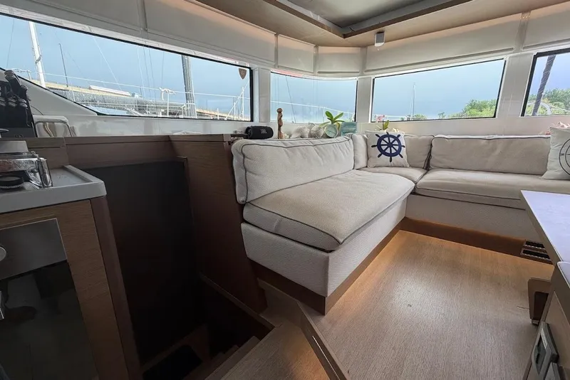 Slide: The Image of Interior of 2021 Lagoon 50 yacht with cozy seating and nautical decor. - 6