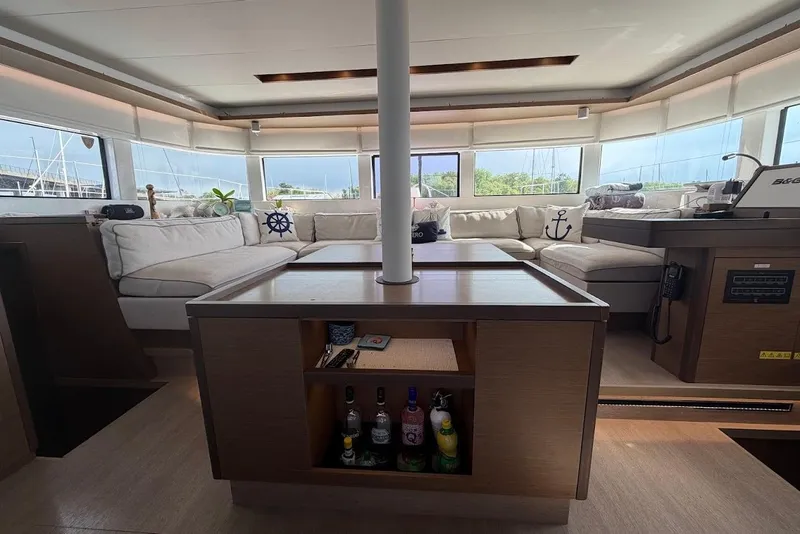 Slide: The Image of Luxurious interior of 2021 Lagoon 50 yacht with plush seating and nautical decor. - 7