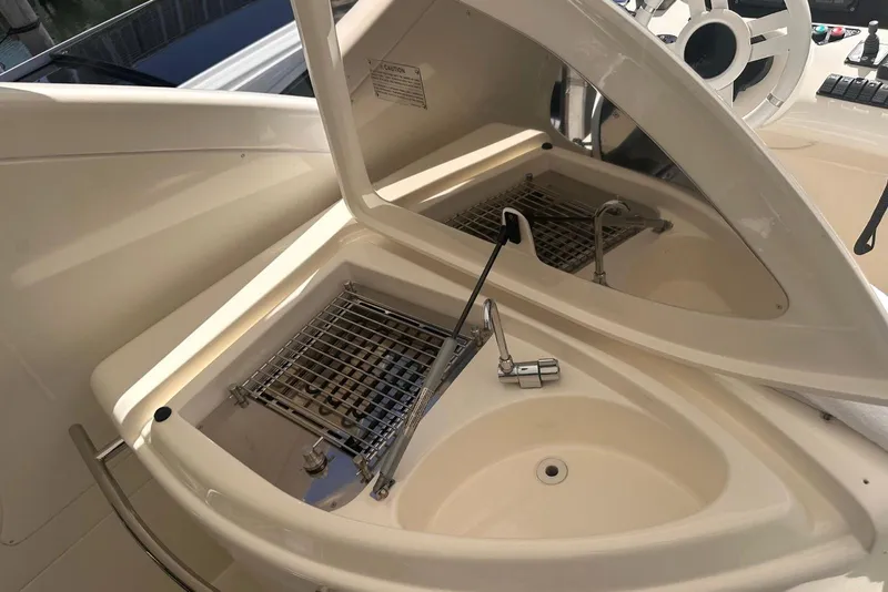 Slide: The Image of 2007 Azimut 55E yacht interior with sink and grill setup. - 28