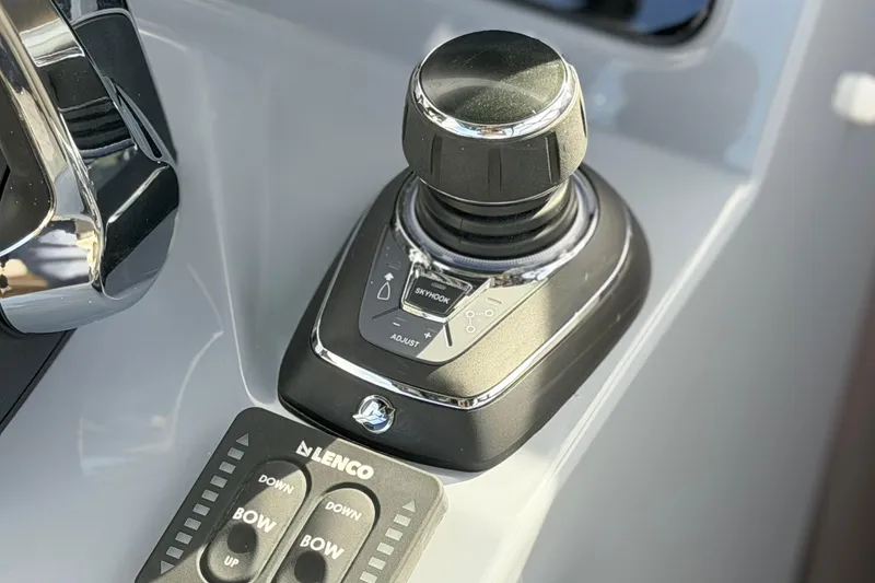 Slide: The Image of Control panel of 2026 Navan S30 boat with joystick and Lenco buttons. - 12
