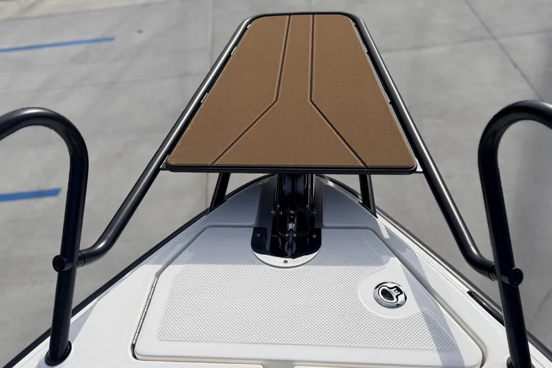 Slide: The Image of Bow of 2026 Navan S30 boat with sleek design and brown deck. - 15