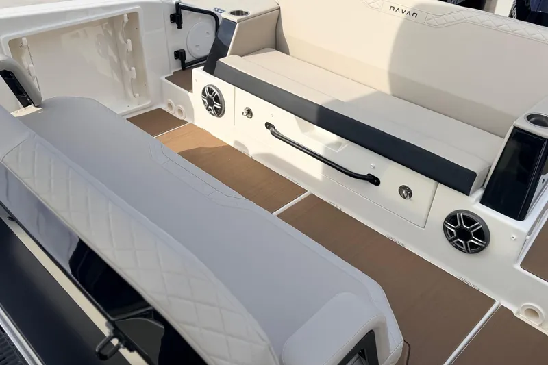 Slide: The Image of Interior of 2026 Navan S30 boat featuring seating and built-in speakers. - 18