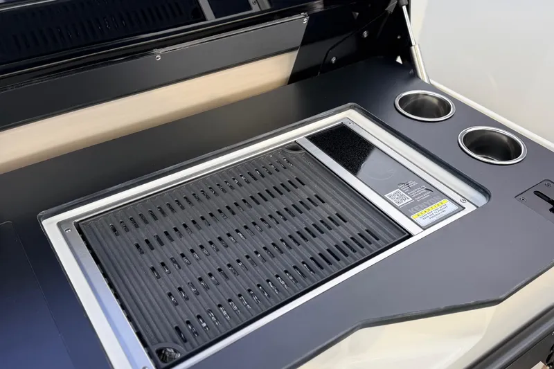 Slide: The Image of Navan S30 2026 vehicle interior with integrated grill and cup holders. - 20