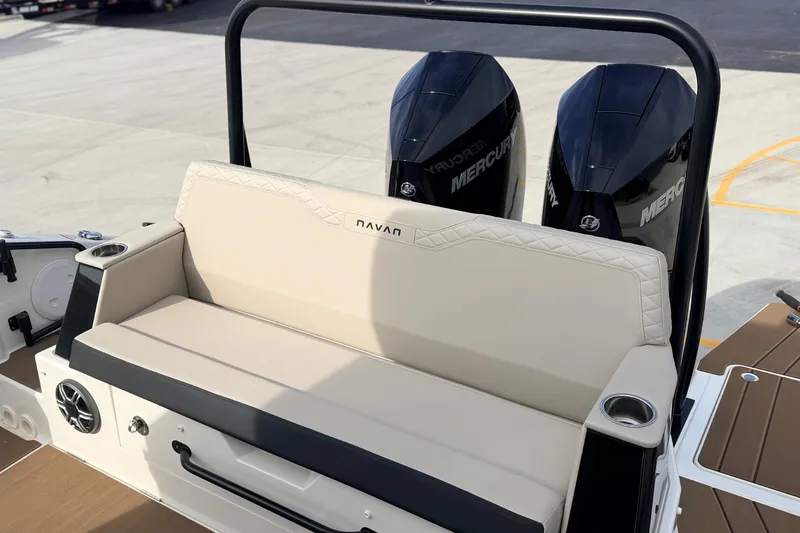 Slide: The Image of Navan S30 2026 boat with dual Mercury engines and beige seating on deck. - 21