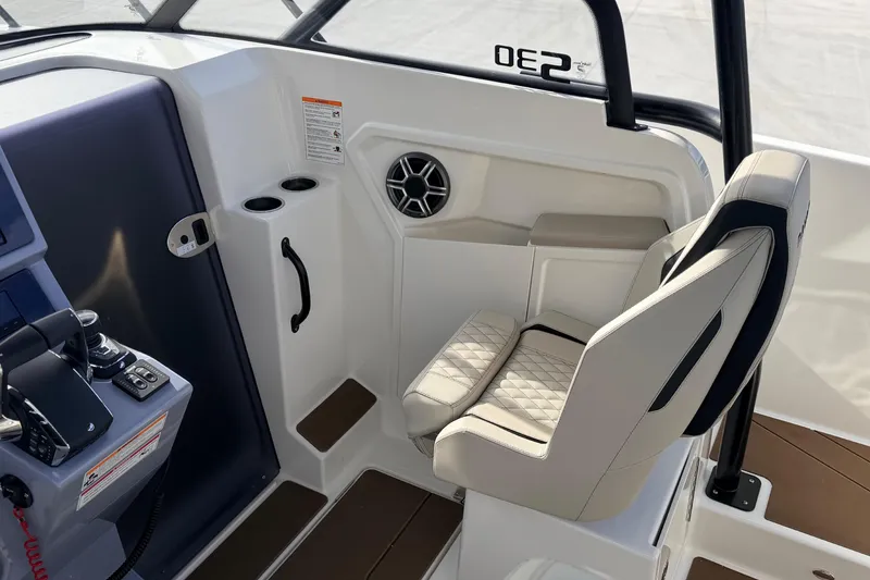 Slide: The Image of Interior of 2026 Navan S30 boat with modern seating and control panel. - 23