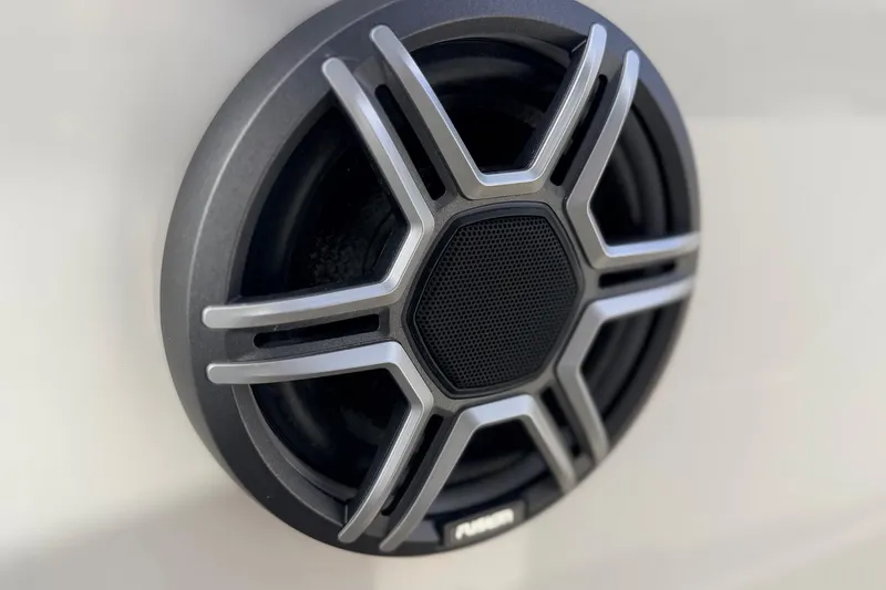 Slide: The Image of Close-up of a Navan S30 speaker grille, 2026 model, featuring a sleek metallic design. - 25