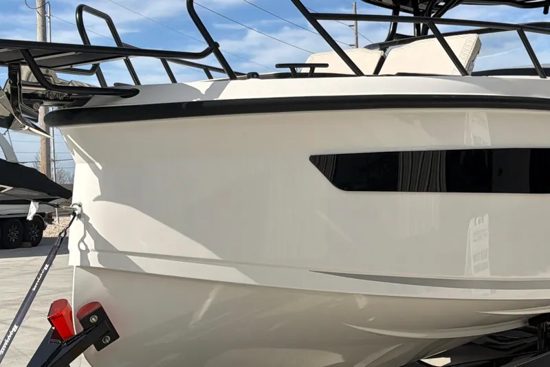Slide: The Image of Navan S30 2026 boat front view with sleek design and modern features. - 4