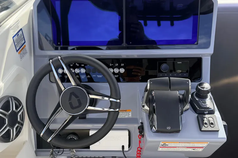 Slide: The Image of Steering console of 2026 Navan S30 boat with advanced controls and displays. - 9