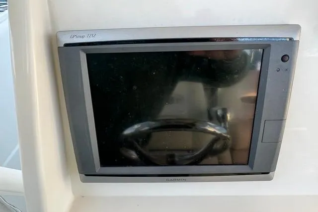 Slide: The Image of Garmin GPSmap 7212 display on 2014 Sailfish 270 CC boat dashboard. - 3