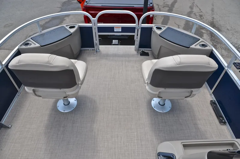 Slide: The Image of 2024 Sun Tracker Bass Buggy 18 DLX pontoon boat interior with swivel seats. - 21