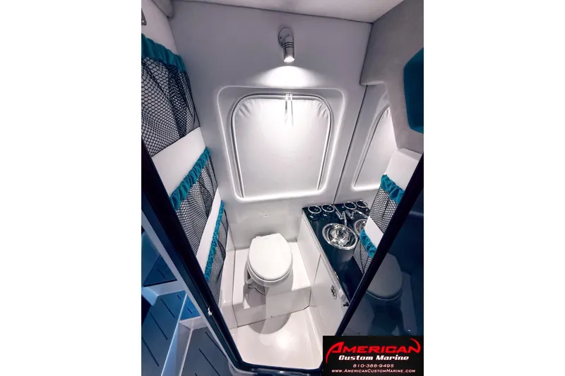 Slide: The Image of Interior of 2027 Nor-Tech 42 Eleven boat bathroom with modern fixtures. - 15
