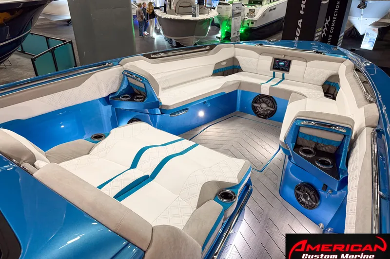 Slide: The Image of Luxurious interior of 2027 Nor-Tech 42 Eleven boat with blue and white seating. - 9