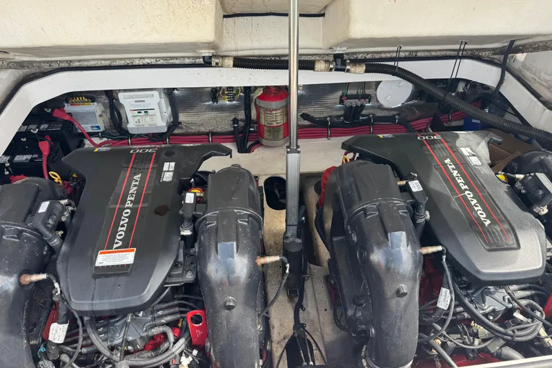 Slide: The Image of Twin Volvo Penta engines in a 2013 Regal 3200 Bowrider boat. - 14