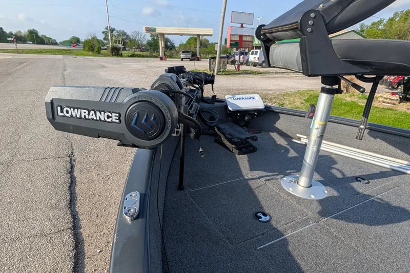 Slide: The Image of 2022 Tracker Pro Guide V-16 SC boat with Lowrance equipment on deck. - 83