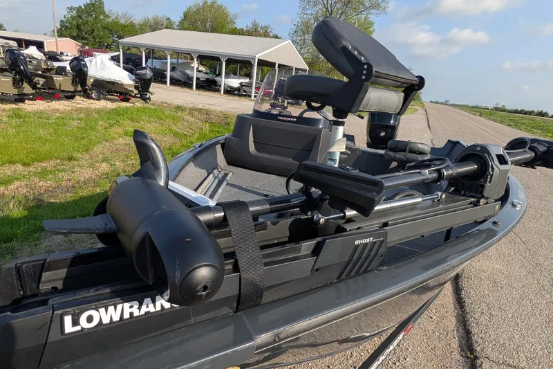 Slide: The Image of 2022 Tracker Pro Guide V-16 SC boat with Lowrance equipment on a sunny day. - 84