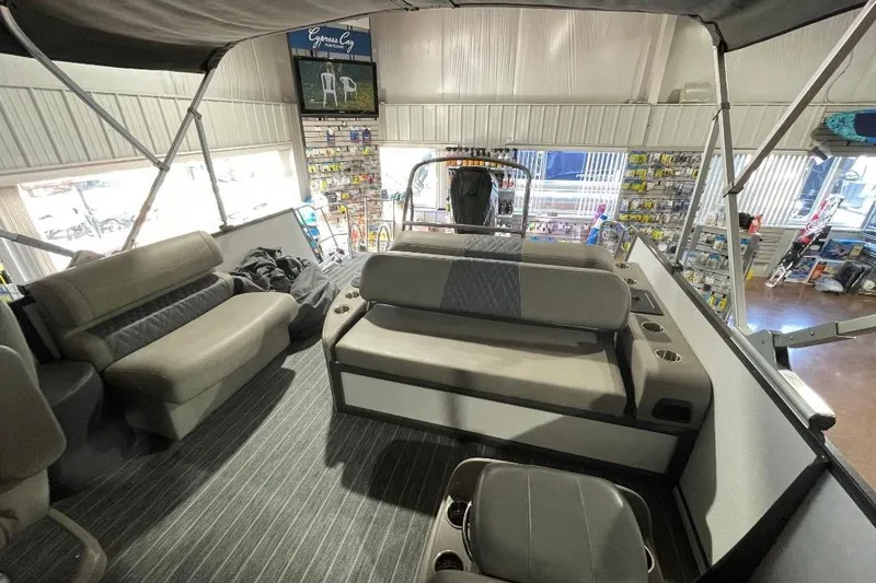 Slide: The Image of Interior of 2024 Premier 270 Intrigue boat with seating and cup holders. - 10
