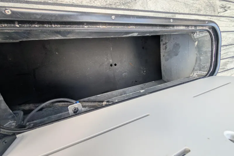 Slide: The Image of Storage compartment of 2025 Veranda Relax VR 22 RC pontoon boat. - 9