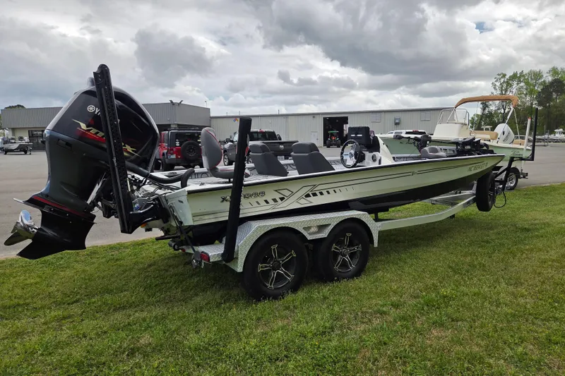 Slide: The Image of 2021 Xpress X21 Pro boat on trailer with Yamaha outboard motor. - 5