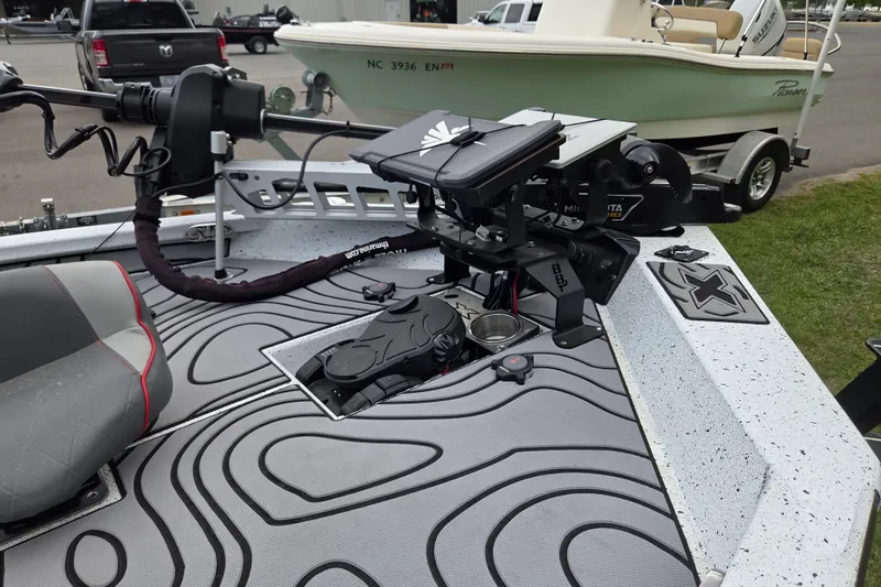 Slide: The Image of 2021 Xpress X21 Pro boat deck with trolling motor and seating. - 8