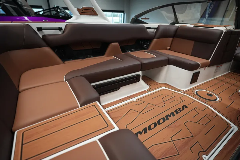 Slide: The Image of Interior of 2026 Moomba Craz with luxurious brown seating. - 12