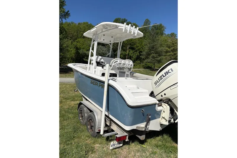 Slide: The Image of 2018 Sea Pro 219 Center Console boat with Suzuki engine on trailer. - 6