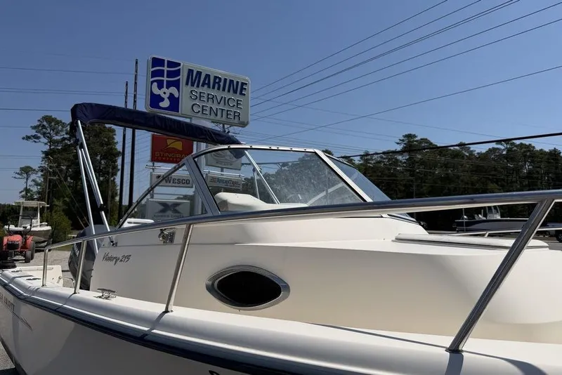 Slide: The Image of 2003 Sea Hunt Victory 215 boat at Marine Service Center, sunny day. - 7
