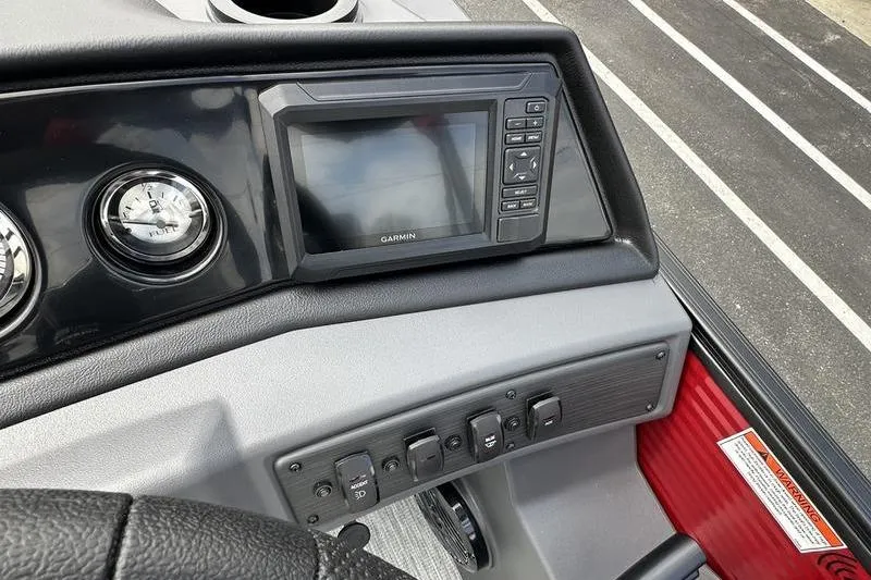 Slide: The Image of Dashboard of 2026 Bennington S Swingback 22 SSB with Garmin display and controls. - 15