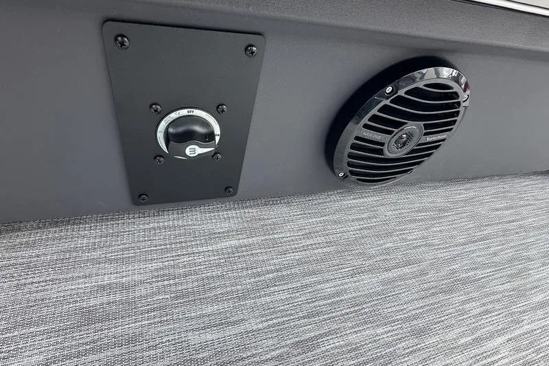Slide: The Image of 2026 Bennington S Swingback 22 SSB interior detail with speaker and control knob. - 27