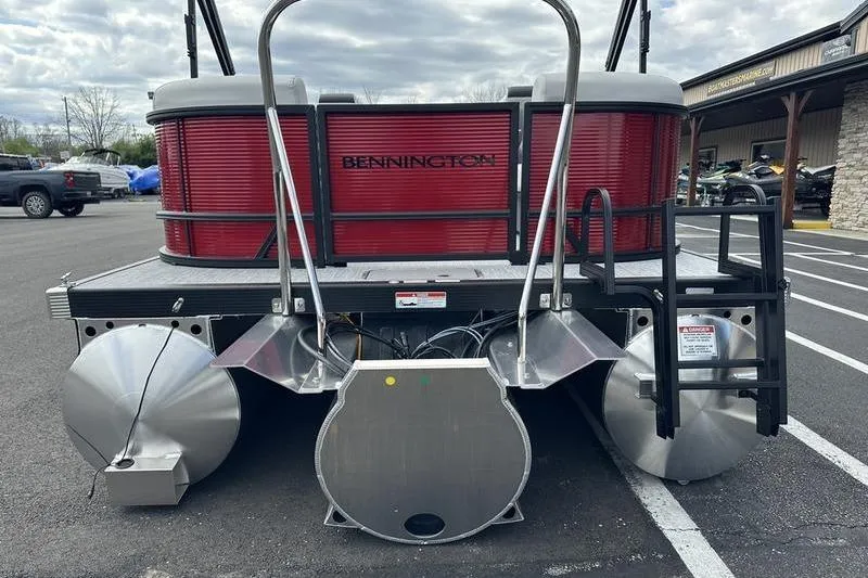 Slide: The Image of 2026 Bennington S Swingback 22 SSB pontoon boat, rear view in parking lot. - 4