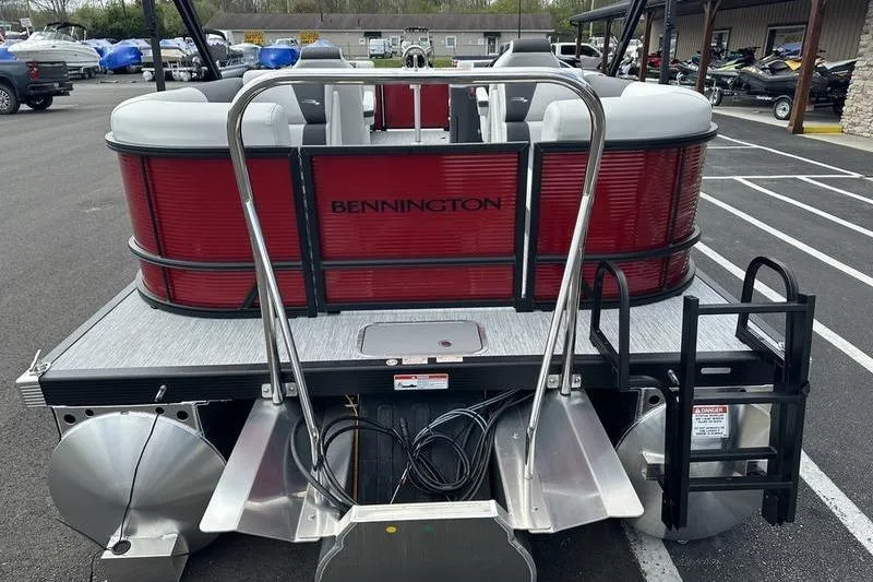 Slide: The Image of 2026 Bennington S Swingback 22 SSB pontoon boat, rear view, red and silver design. - 7