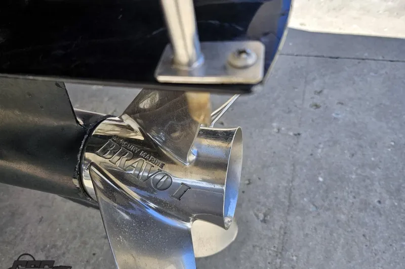 Slide: The Image of Close-up of a Mercury Marine Bravo I propeller on a 2001 Powerquest 340 Vyper boat. - 103