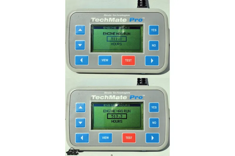 Slide: The Image of Digital display showing engine hours for 2001 Powerquest 340 Vyper, reading 511.0 and 513.3 hours. - 106