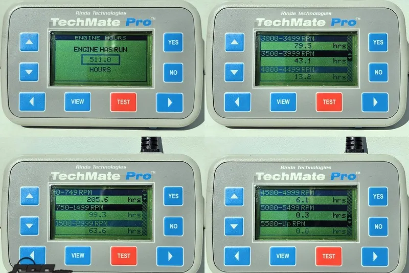 Slide: The Image of TechMate Pro engine diagnostic display for 2001 Powerquest 340 Vyper, showing engine hours and RPM data. - 107