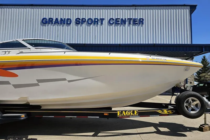 Slide: The Image of 2001 Powerquest 340 Vyper boat on trailer at Grand Sport Center. - 11