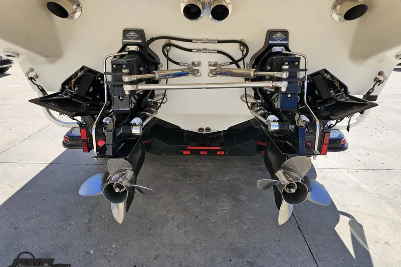 Slide: The Image of Rear view of 2001 Powerquest 340 Vyper boat with dual propellers. - 24