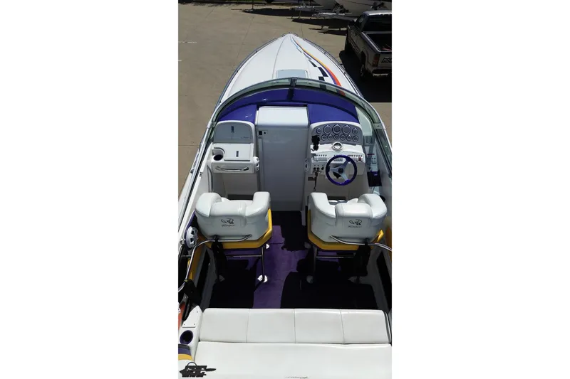 Slide: The Image of 2001 Powerquest 340 Vyper boat interior with dual seats and control panel. - 30
