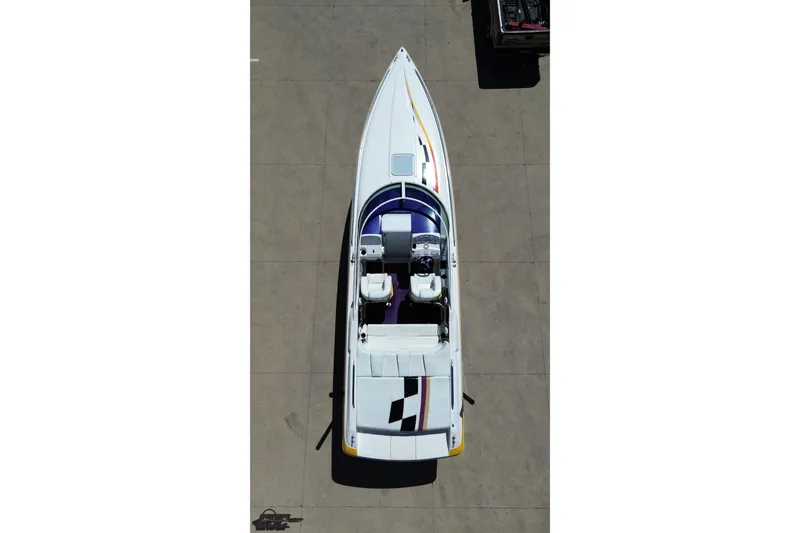 Slide: The Image of Overhead view of a 2001 Powerquest 340 Vyper speedboat on a concrete surface. - 31
