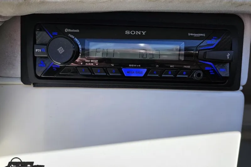 Slide: The Image of Sony stereo system in a 2001 Powerquest 340 Vyper boat dashboard. - 73