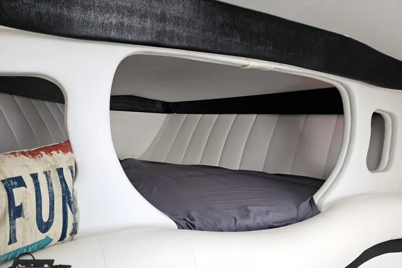 Slide: The Image of Interior cabin of 2001 Powerquest 340 Vyper boat with cozy sleeping area. - 76