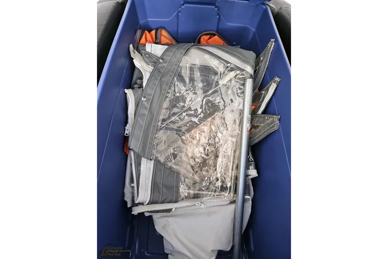 Slide: The Image of Blue container holding folded boat cover for 2001 Powerquest 340 Vyper. - 81