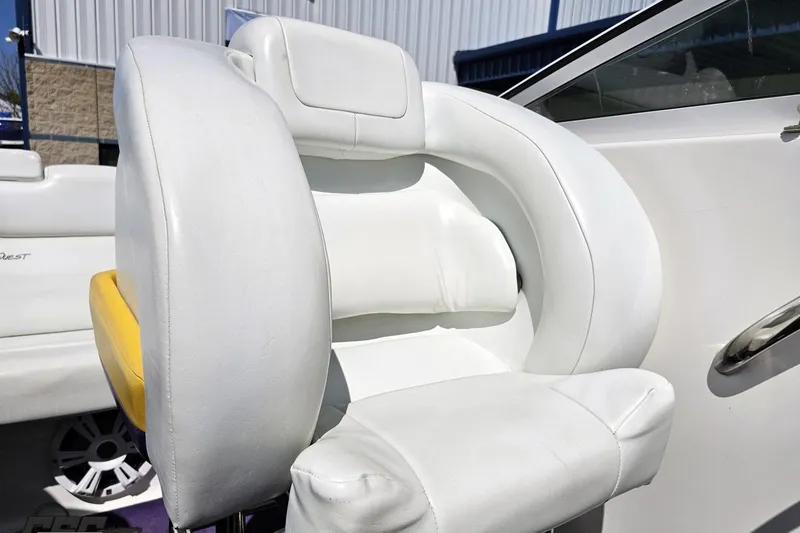 Slide: The Image of White leather seat on a 2001 Powerquest 340 Vyper boat, showcasing luxury and comfort. - 85