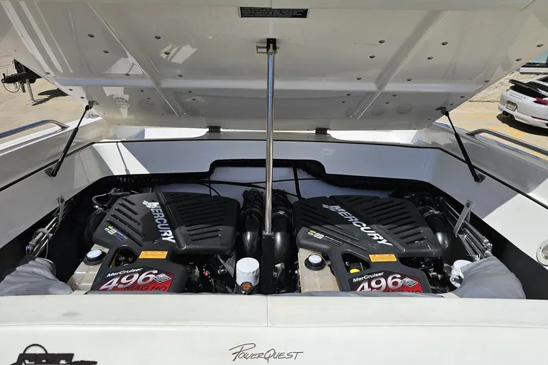Slide: The Image of 2001 Powerquest 340 Vyper boat engine compartment with twin Mercury 496 MAG HO engines. - 95