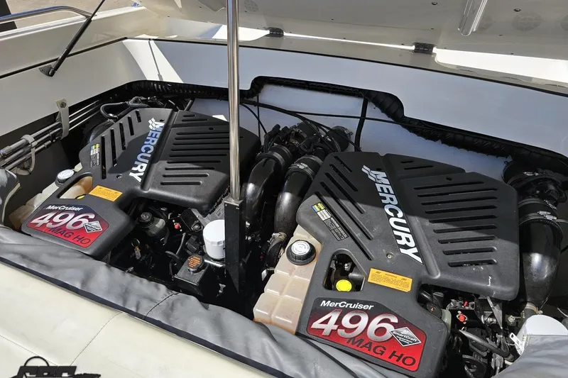 Slide: The Image of Twin MerCruiser 496 MAG HO engines in a 2001 Powerquest 340 Vyper boat. - 96